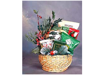 Christmas gift basket filled with pretzels, chips, cookies and cocoa.