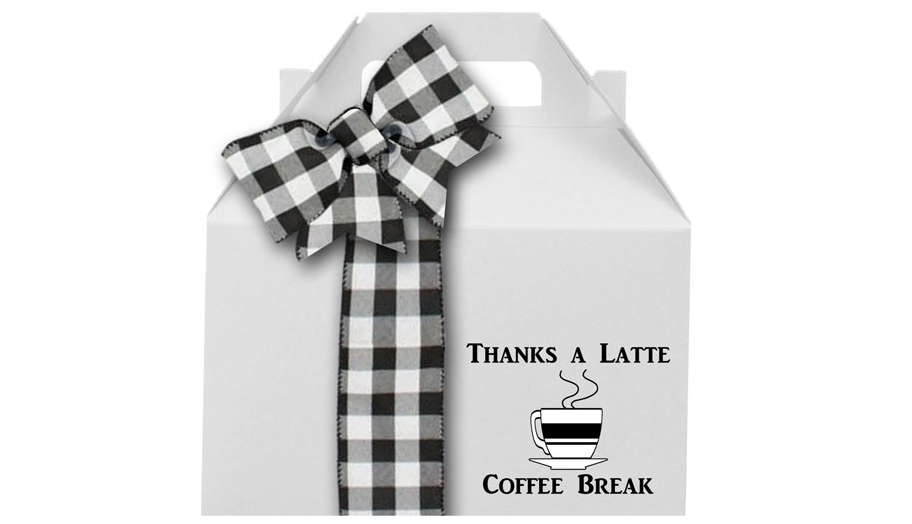 Image white gift box with Thanks a Latte label filled with coffee, cookies and chocolate.