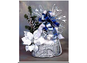 Picture of silver holiday gift basket filled with sweet and savory items.